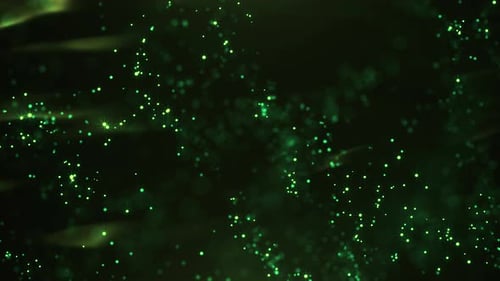Abstract Green Glowing Particles Moving Background