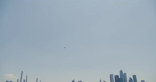 Tilt Down From Passing Helicopter To Manhattan Skyline In New York City, U.S.A.