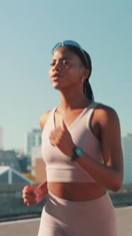 Black woman, running or fitness in city for workout, cardio exercise or outdoor training