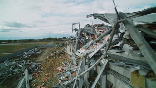 Aerial Motion Along Demolition Site of Abandoned Stadium