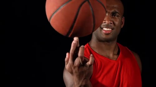 Cinemagraph - Basketball Player Spins Ball on Finger, . Looping Motion