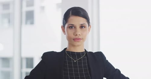 Confident Businesswoman Standing in Modern Office Building