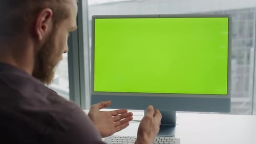 Student Talking Mockup Device Online Indoors Closeup. Young Man Using Chroma Key
