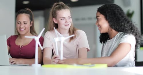 High school students studying renewable energy