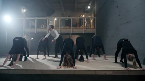 Wide Shot Concentrated Theater Director Leading Rehearsal As Young Actors and Actresses Walking with