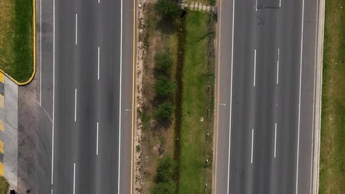 Aerial View of Highway Traffic on Sunny Day
