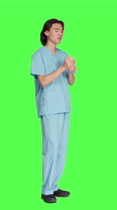 Side View of Asian Assistant Sipping Cup of Coffee