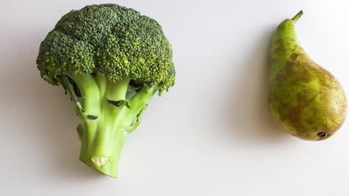 Fruits and Vegetables Arranged on a White Background