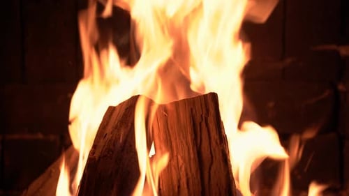 Burning Fireplace Logs for Cozy Holiday Season