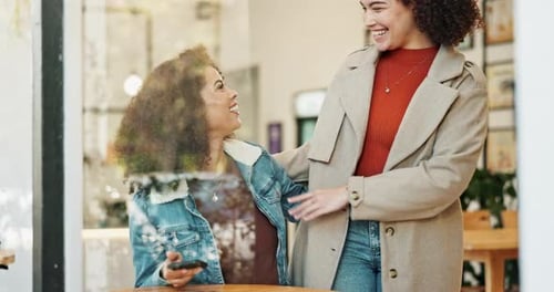 Coffee shop, friends and hug with greeting, happy and reunion of women with smile and chat