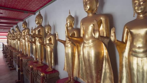 Gilded Buddha statues in Wat Pho, Bangkok, Thailand