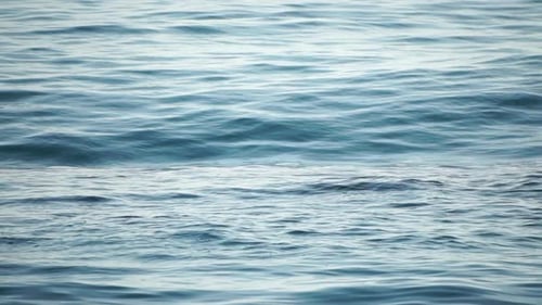 Sea Water Surface Low Angle View Over Clear Azure Sea Water Sun Glare Abstract Nautical Summer Ocean