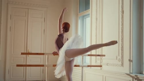 Back View of Graceful Ballerina Performing Graceful Steps and Slow Arms Movement Slow Motion Shot