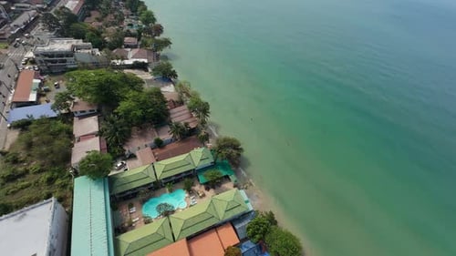 Tropical Coastline Showing Hotels and Resorts Along Turquoise Ocean