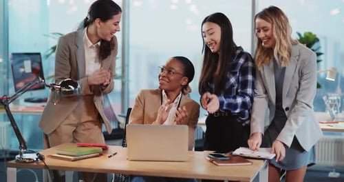 Happy Multirace Company of Attractive Women Brainstorming Solution in Corporate Office Applauding