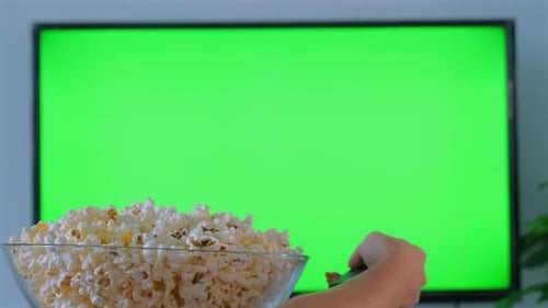 Popcorn Bowl in front of Green Screen Television