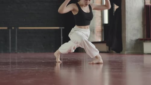 Barefoot Woman Dancing Contemporary in Studio