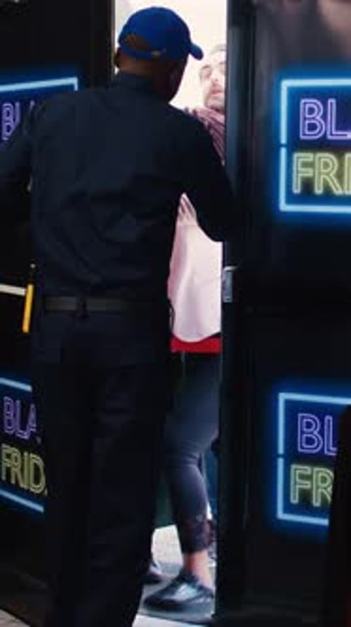 Shoppers Pushing Doors Open for Black Friday Sale