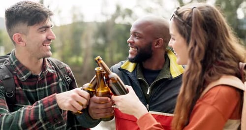 Forest, cheers and group of people with beer at party together happy and friends laughing