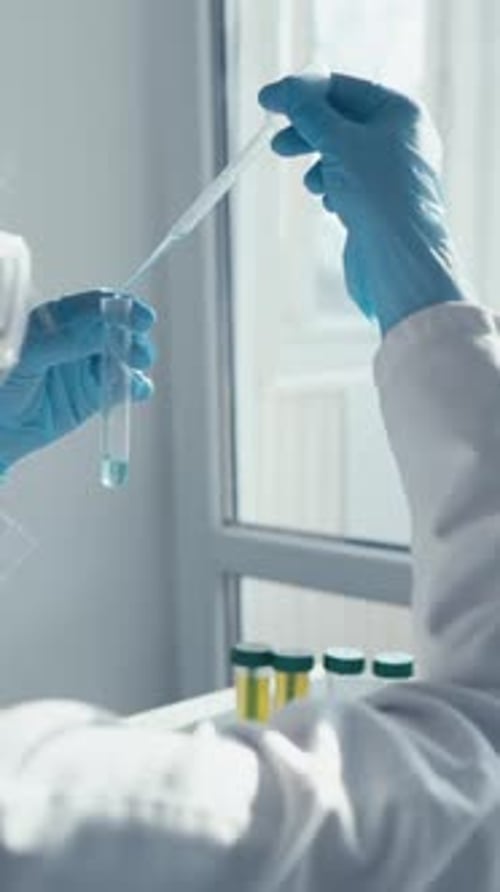 A Dedicated Scientist Conducts Complex Experiments in a Modern Medical Lab Focusing on Advances in