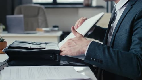 Businessman Starting Work in Office