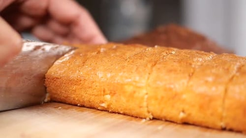 Golden Cake Loaf Sliced on Cutting Board