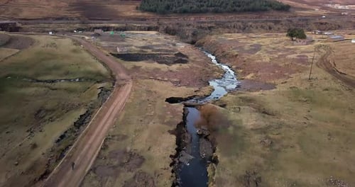 Road, nature and river in countryside from drone with natural environment, farming and green land