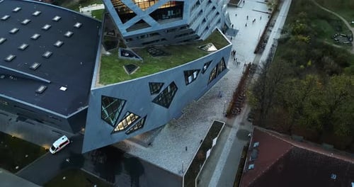 reveal Drone shot of a abstract building with Intressting architecture