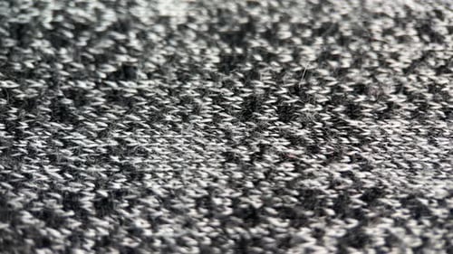 Macro View of Gray and White Knitted Fabric