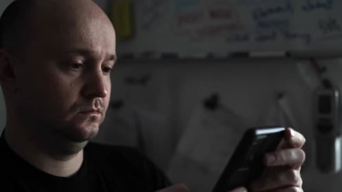 Creative Journaling: Man Working from Home Office