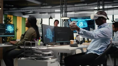 Technician in Office Using VR Headset Equipment to Accelerate AI Calculations