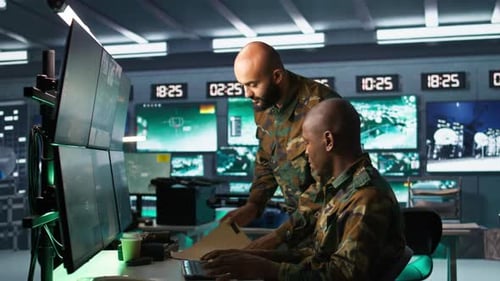 Soldier in Military HQ Base Doing Brainstorming with Coworker