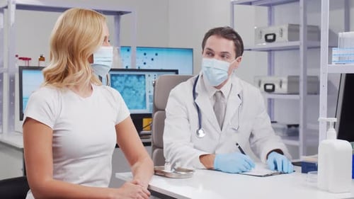 Doctor Makes a Coronavirus Vaccine Using a Syringe and Hypodermic Needle Professional Medical Worker