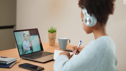 Girl Attending Online Math Class at Home