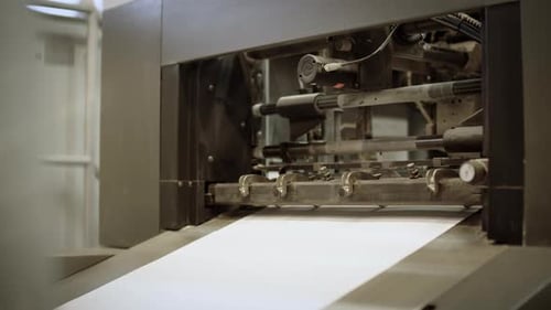 Industrial Printer Processing Sheets of Blank White Paper
