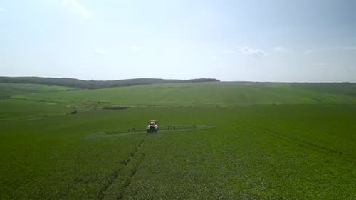 Spray Fertilize On Field With Chemicals In Agriculture Field