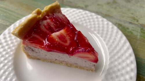 Slice of Strawberry Pie on Plate