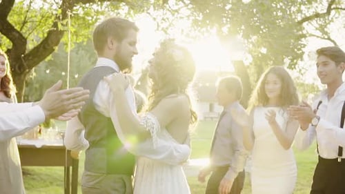 Bride and Groom Dancing at Outdoor Wedding Reception