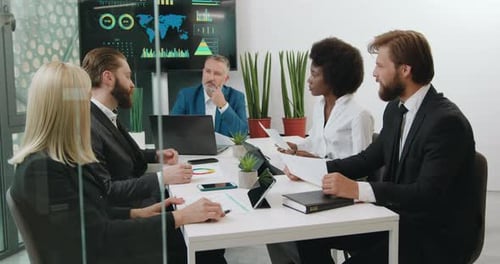 Diverse Team Collaboration in Modern Office Setting