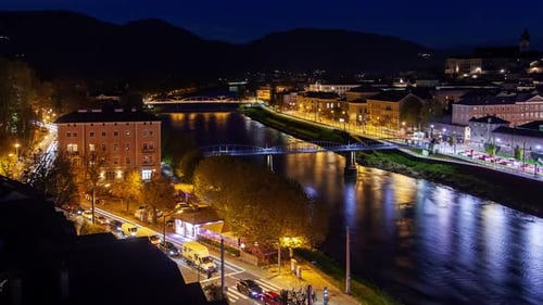 Autumn Night Timelapse of Salzburg Austria Skyline with Partly Clouds
