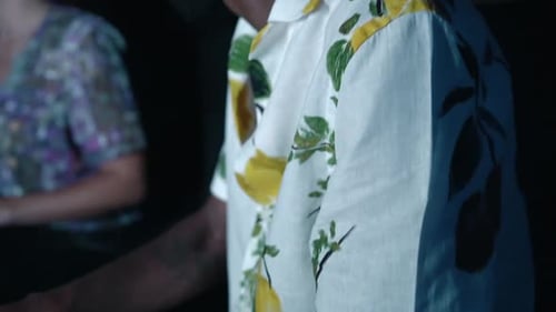 Portrait of audio engineer or producer working in music recording studio with LED light next to comp