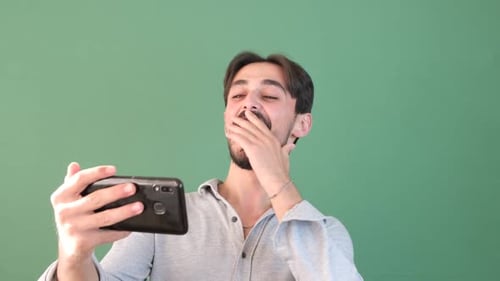 Loughing Watching Phone