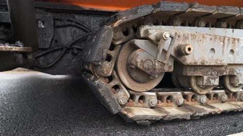 Construction Vehicle Metal Track Rolling Close-up