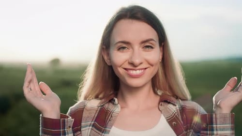 Smiling Woman in Rural Setting