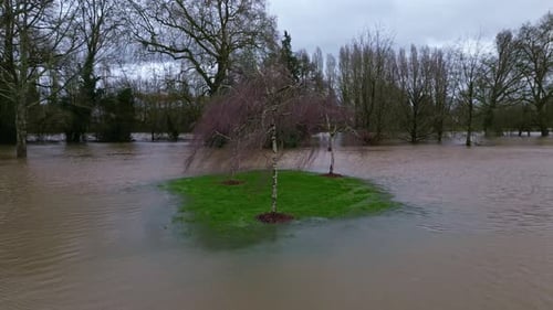 Flooding at Ondines Park, Changé en Mayenne, France. Aerial backward at low altitude
