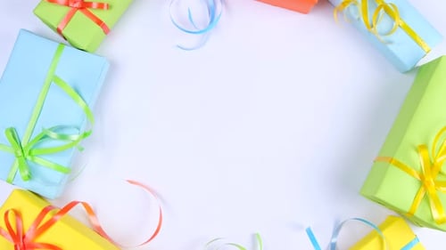 Rotating Background or Frame with Place to Insert Text with Festive Boxes of Different Colors with