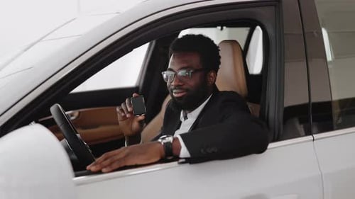 Man Proudly Shows New Car Keys