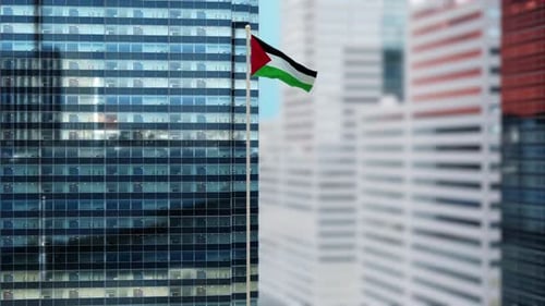 Palestinian Flag Waving on Modern Corporate Building