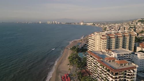 Aerial Drone Fly Beachfront Puerto Vallarta Hotels in Mexican Summer Beach Sea Landscape, Vibrant Re
