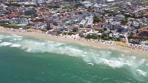 Aerial drone hight scene beach florianópolis seen from the top seaside town near the sea buildings u